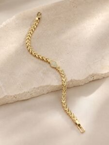 Xuping zirkon taşlı balıksırtı zincir tasarımlı gold kadın bileklik.